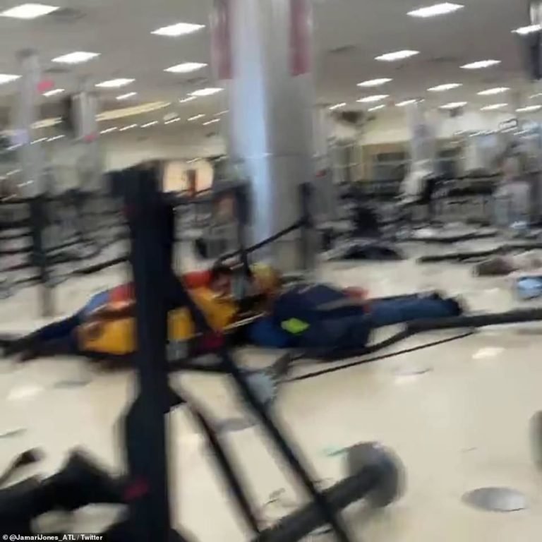 People seen lying on the ground scrambling for cover after shots reported fired in Georgia airport