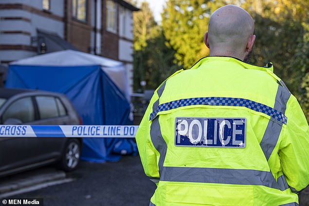 Man, 35, arrested on suspicion of murder after man and woman found dead at house in Lancashire 
