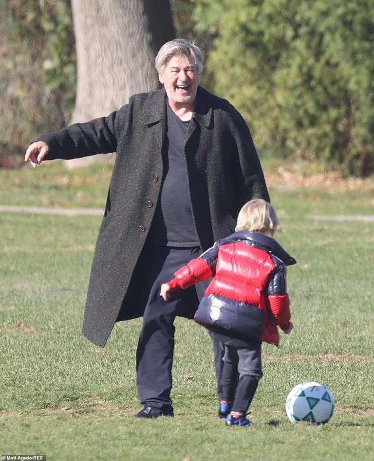 Alec Baldwin seen smiling for the first time since Rust shooting as he plays soccer with his kids