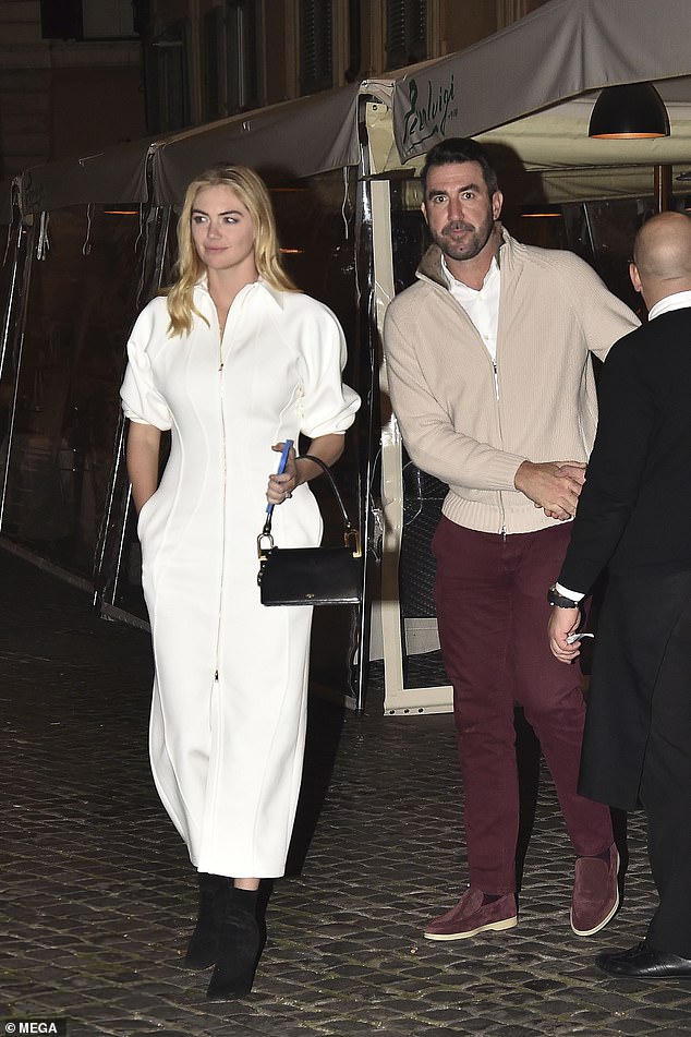 Kate Upton shares a kiss with husband Justin Verlander during romantic dinner in Rome 