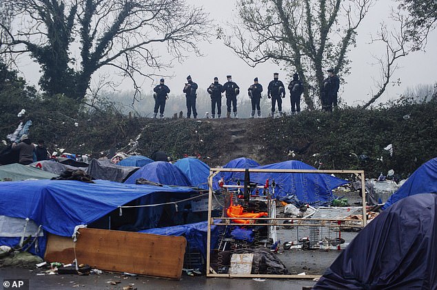 France finally cracks down on migrant smuggling as 15 gang members are rounded up