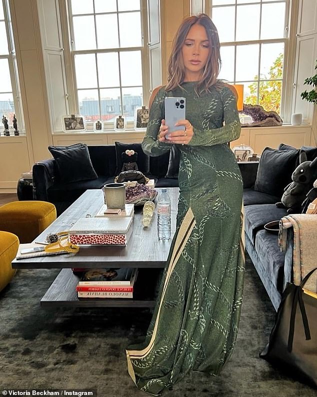 Victoria Beckham looks flawless in an elegant £990 green gown from her own clothing collection