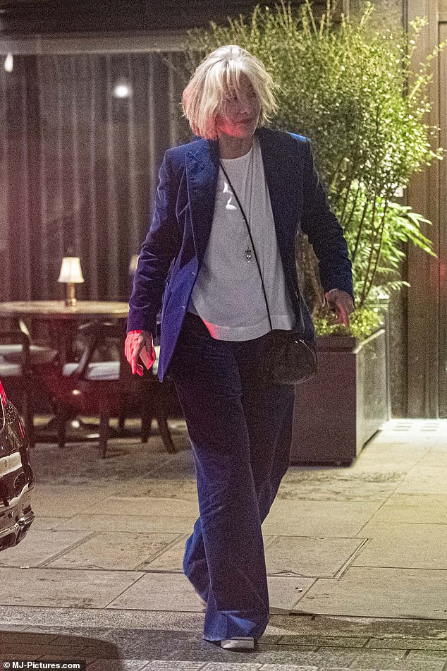 Dame Emma Thompson looks worse for wear as she chats to a Big Issue seller after night out