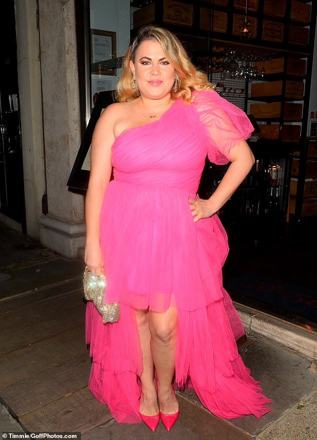 Nadia Essex cuts a VERY glamorous figure in a billowing pink gown to celebrate her 40th birthday