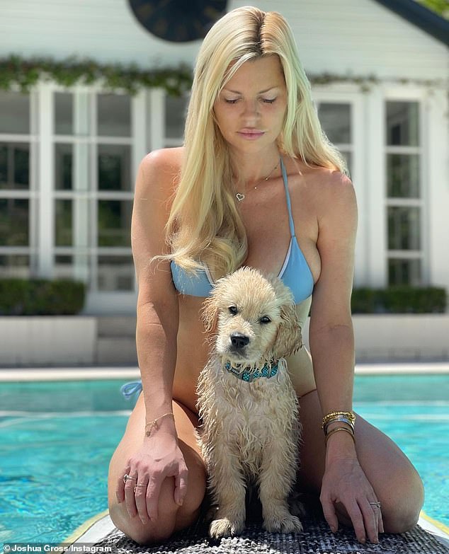Sophie Monk strips down to a skimpy blue bikini as she enjoys dip with dog