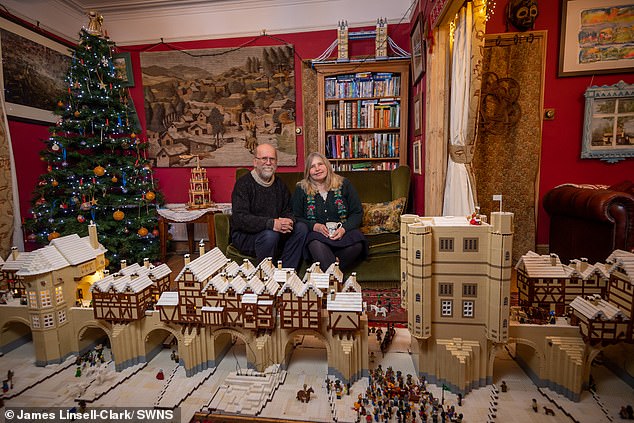 Lego-loving Cambridge couple show off a 21ft-long replica of Old London Bridge in their living room