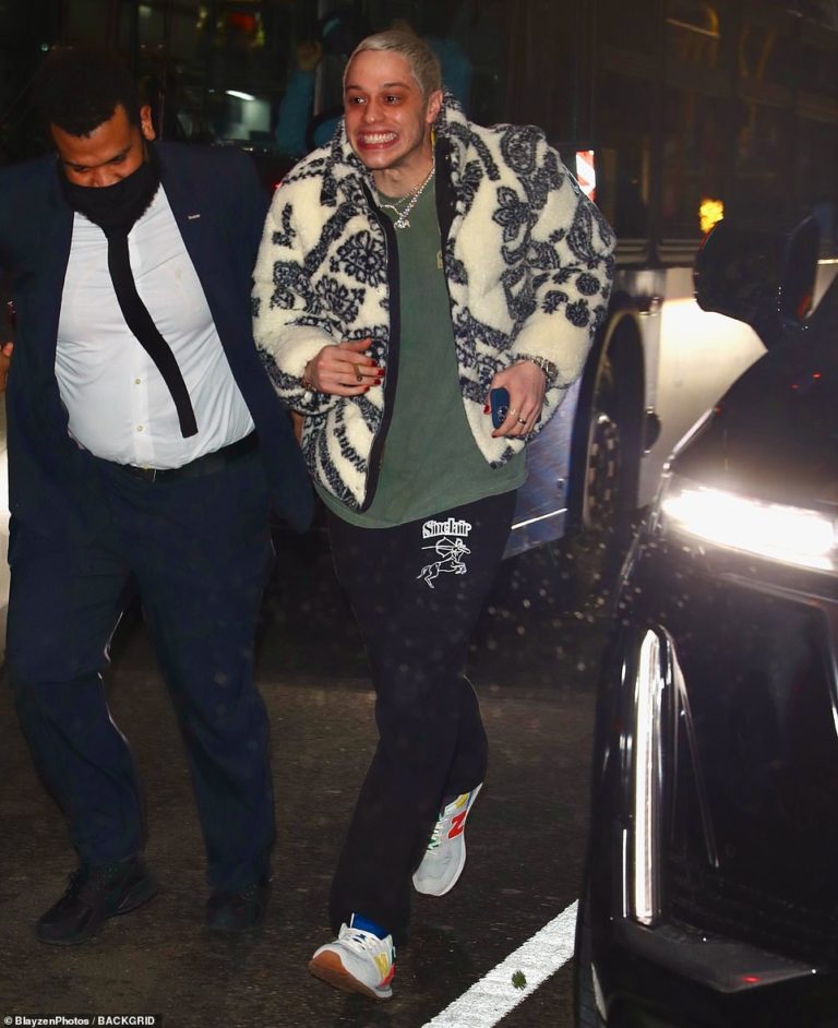 Pete Davidson leaves Kim Kardashian’s hotel with a big grin after ‘spending the night’