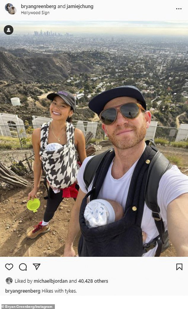 Jamie Chung and Bryan Greenberg take their infant twins on a hike near the Hollywood sign