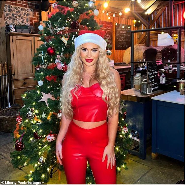 Liberty Poole sends temperatures soaring in busty and ab-flashing red leather co-ord