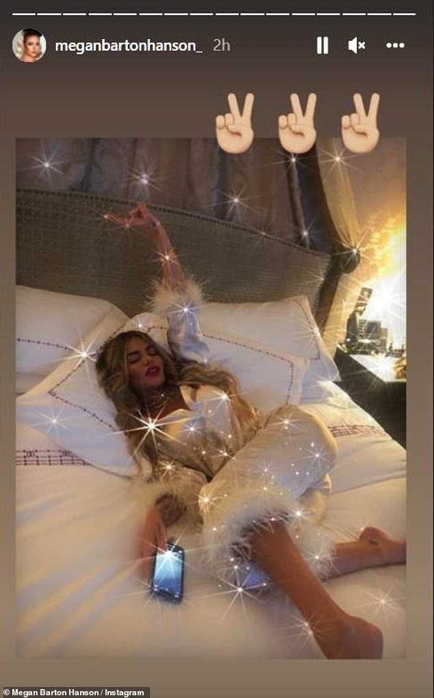 Megan Barton Hanson dazzles in silk jumpsuit as she sprawls on bed after... split from James Lock  1