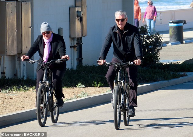 Pierce Brosnan and wife Keely Shaye Smith match in dark clothes as they enjoy bike ride in Malibu 1