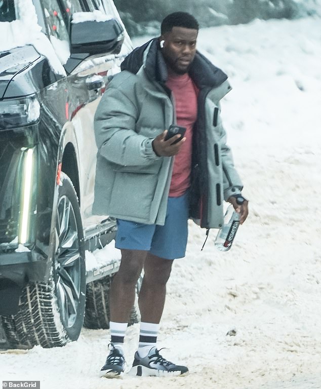 Kevin Hart steps out for exercise session in snowy Aspen only wearing shorts as get-away continues