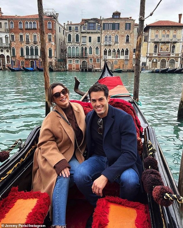 Kelly Brook beams as she cosies up to partner Jeremy Parisi on a gondola in Venice