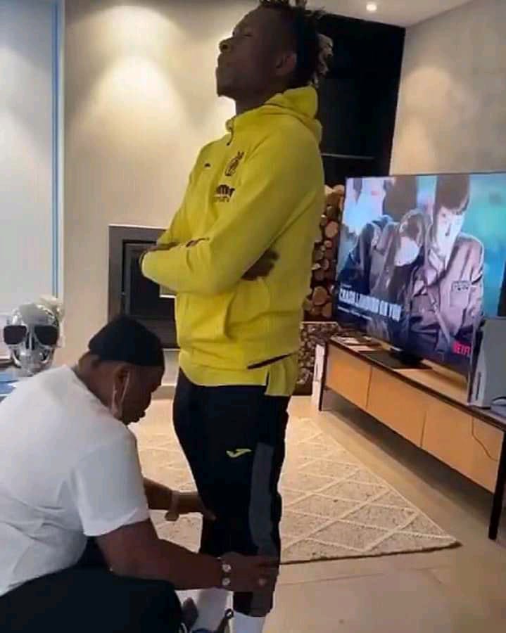 Mother of Super Eagles star holds son's legs, offers prayer ahead of AFCON 2021! [Video] 1