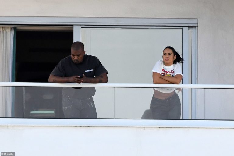 Kanye West hangs out with ab-baring mystery girl… before scantily-clad woman steps out