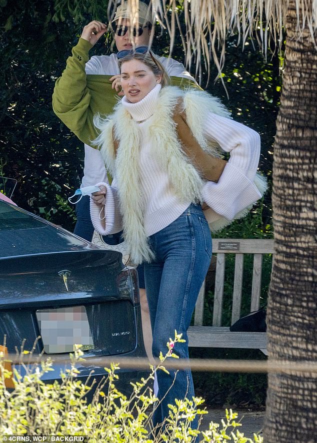 Elsa Hosk keeps casual in turtleneck and jeans at The Huntington Library with family on New Year's 1
