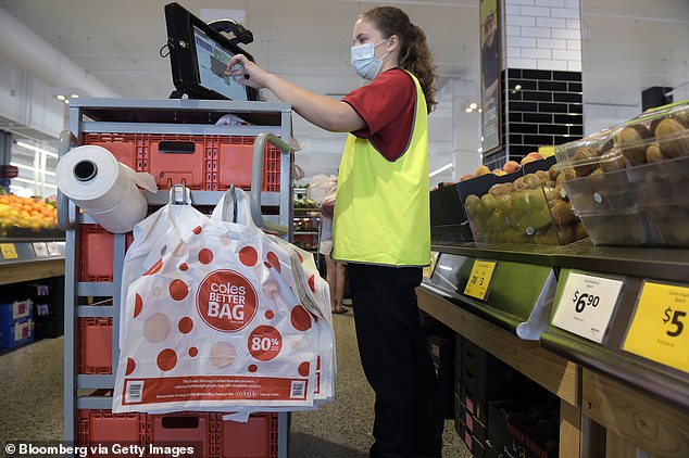 Coles reintroduces product limits to curb panic buying as Covid causes staff shortages