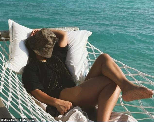 ‘Still out of office!’: Alex Scott reclines on an ocean hammock while basking in the Maldives sun