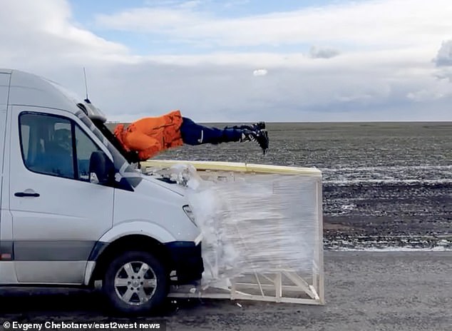 Russian stuntman flies through Mercedes minibus going 50mph