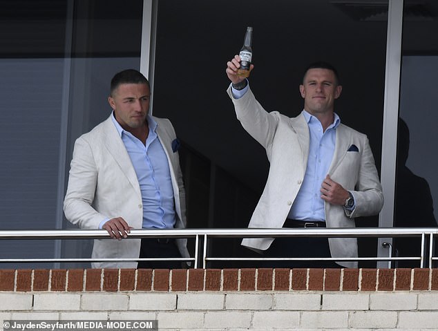 Sam Burgess and brother Luke look dapper in suits as they crack open beers ahead of Tom’s wedding