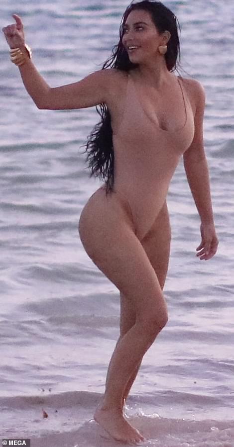 Kim Kardashian shows off sensational beach body as she prances in Caribbean during SKIMS photo-shoot
