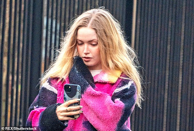 Ellie Bamber the selfie queen! Actress spotted taking pictures of herself on the streets of London 