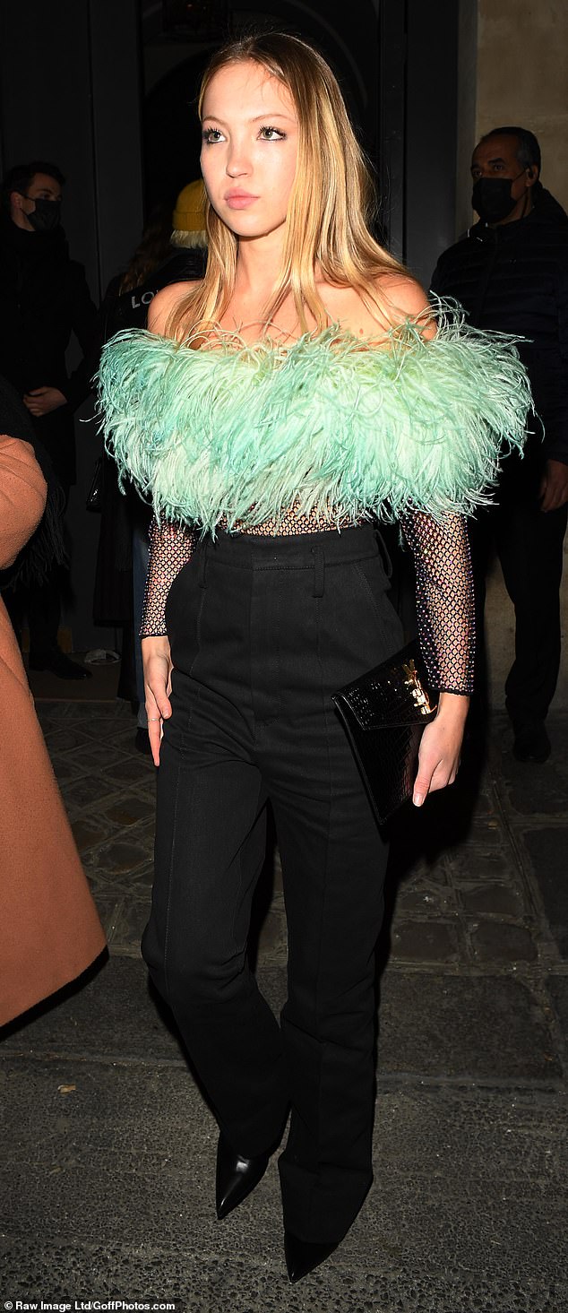 Lila Moss is every inch the chic fashionista as she heads to the Saint Laurent after-party in Paris