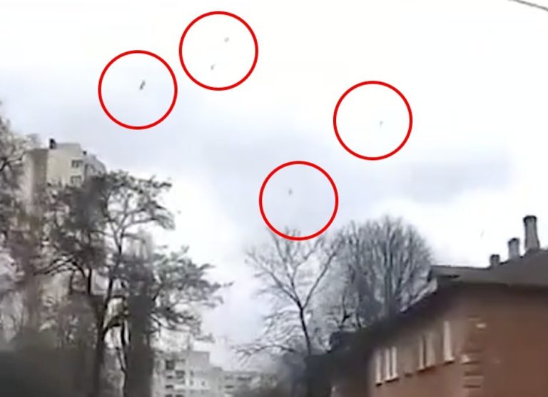 Bombs rain down on tower block obliterated by blast caught on dashcam in Ukrainian city
