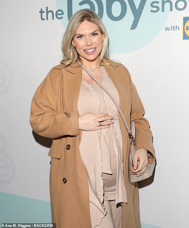 Pregnant Frankie Essex cuts a stylish figure in a tan trench coat as she shows off her baby bump