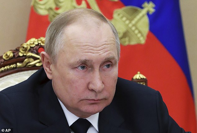 ALEX BRUMMER: Putin takes Russia to the edge of a monetary precipice