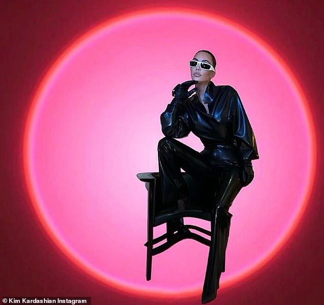 Kim Kardashian brings back the 1970s in bold black leather modeling shoot
