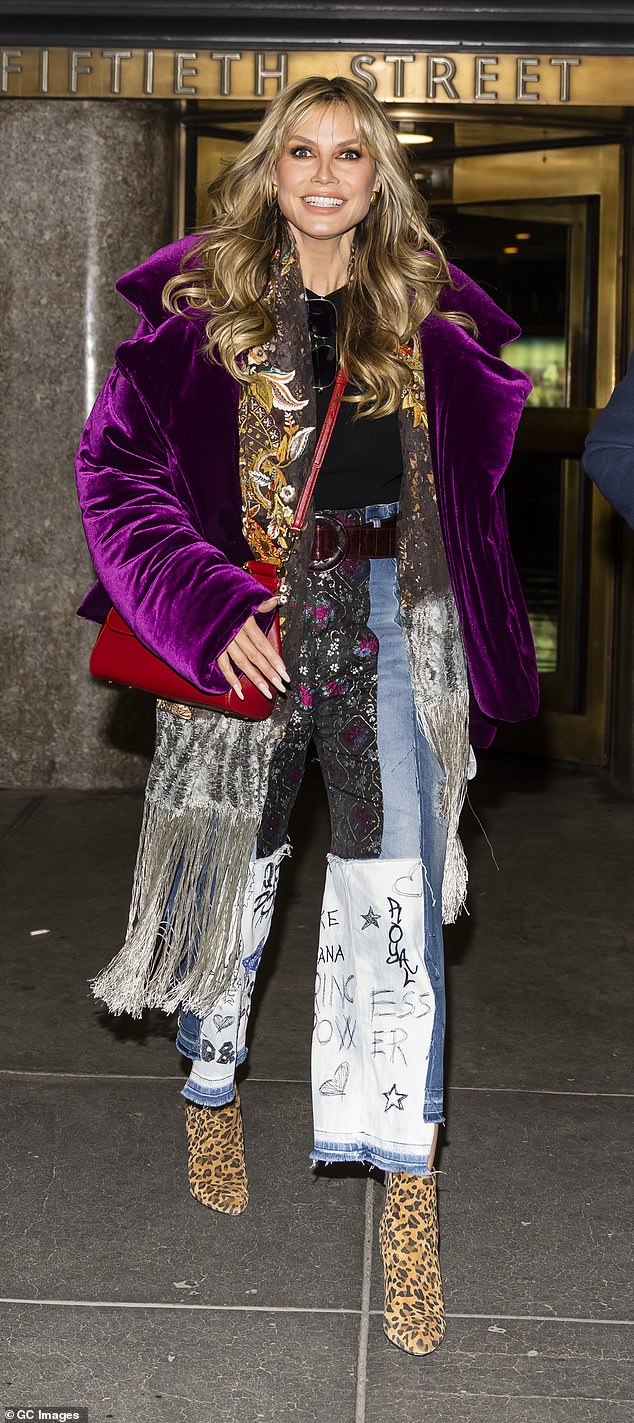 Heidi Klum stands out in purple velvet jacket and blue jeans alongside husband Tom Kaulitz in NYC