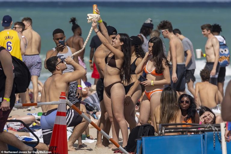 Thousands of Spring Breakers PACK Miami beaches and head the clubs at night in record numbers