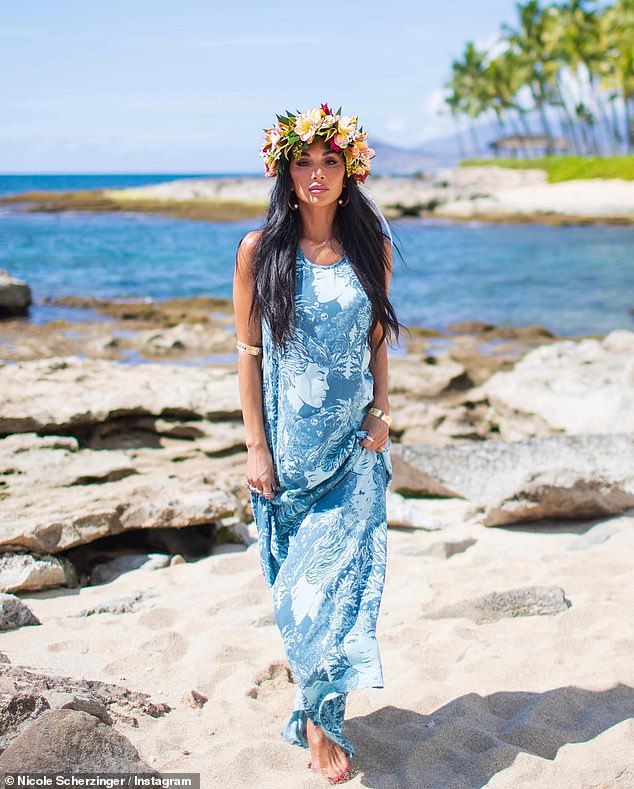 Nicole Scherzinger wows in a traditional flower crown and a patterned sun dress