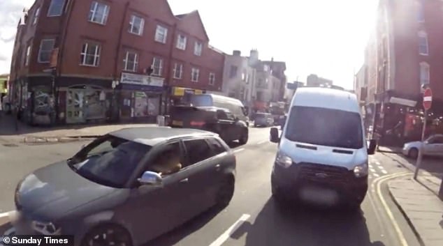 Cyclist who films motorists committing offences at the wheel says HE is now facing a fine of £1,000