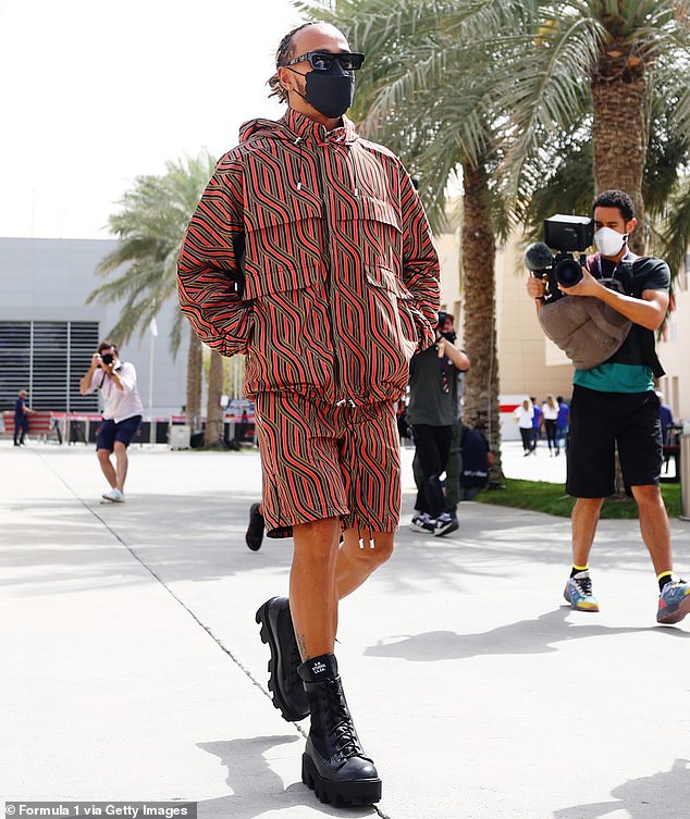 Masked-up Lewis Hamilton catches the eye in a quirky co-ord ahead of the Bahrain Grand Prix
