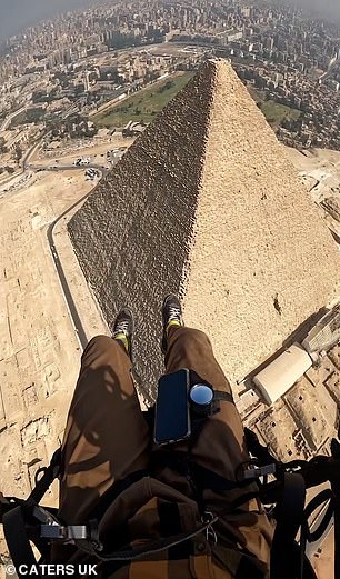 Paraglider swoops over the Pyramids and captures stunning aerial footage of the Sphinx [Video]