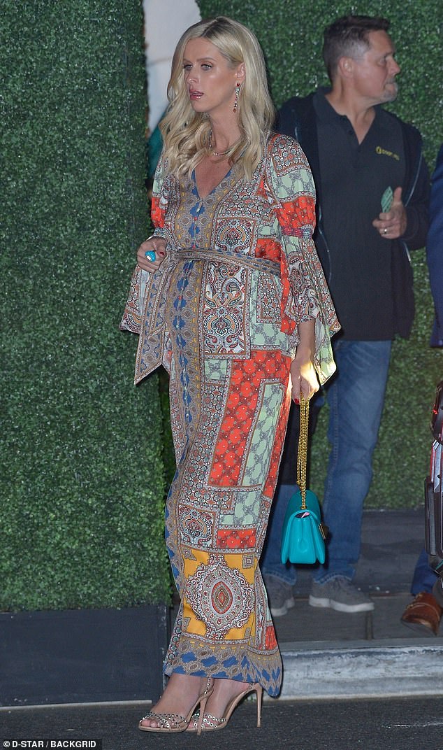 Pregnant Nicky Hilton flaunts her growing bump in a paisley printed maxi dress