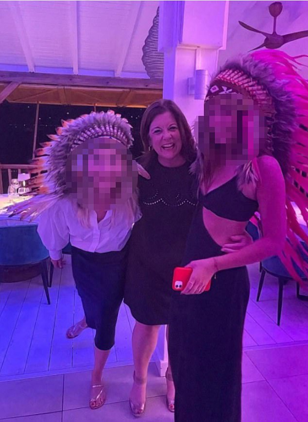 US Chamber of Commerce CEO posed with two white women wearing Native American headdresses
