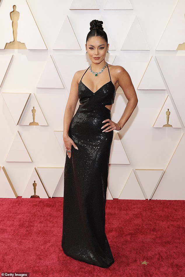 Vanessa Hudgens smolders in a sexy black dress to host The Oscars Red Carpet Show at Academy Awards