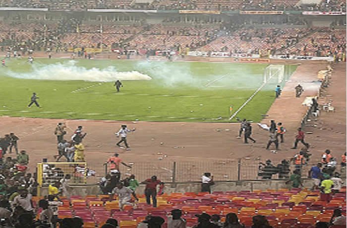 Angry Nigeria fans vandalize Abuja stadium facilities, police tear gas mob 1