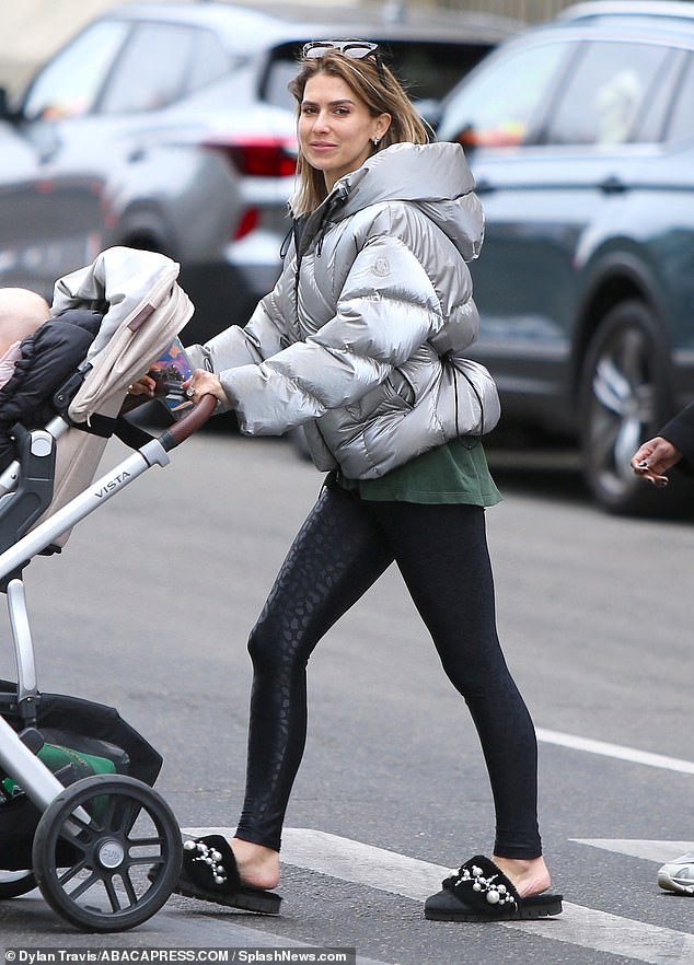 Pregnant Hilaria Baldwin pushes a pram carrying her youngest children in New York