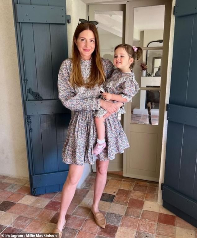 Millie Mackintosh poses with her daughter Sienna in matching floral dresses