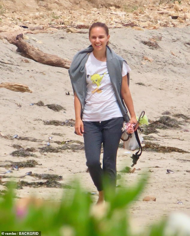 Natalie Portman keeps it casual in Tweety Bird T-Shirt and sweats as she takes her dogs to the beach