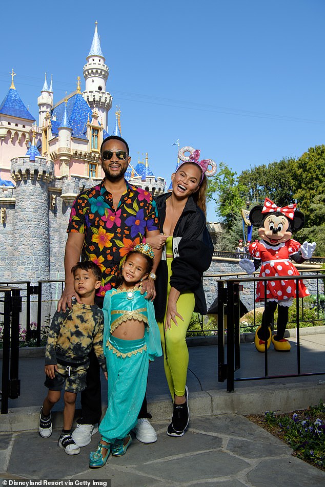 Chrissy Teigen and John Legend take their kids Luna, six, and Miles, three, to Disneyland