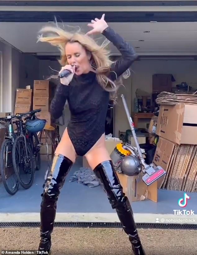Amanda Holden admits she splashed out on tight latex dresses and thigh-high boots after turning 50