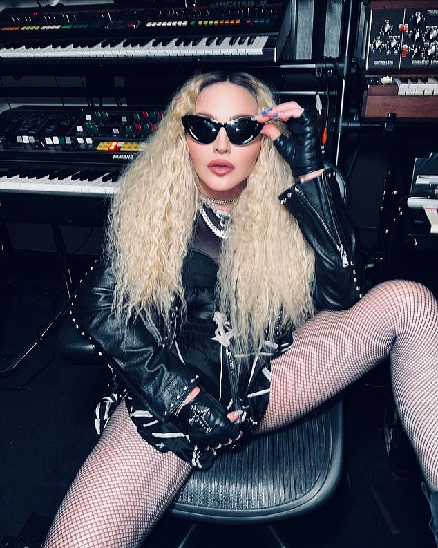 Madonna, 63, shares VERY raunchy shots of herself in studded black leather jacket and fishnet tights