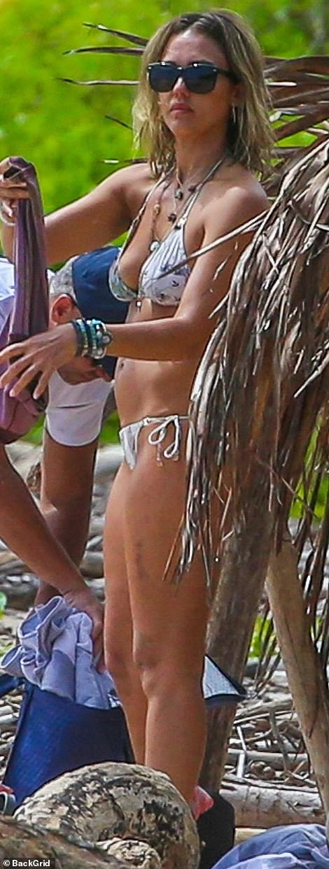 Jessica Alba EXCLUSIVE: She is in a bikini top as she kisses husband of 14 years Cash Warren