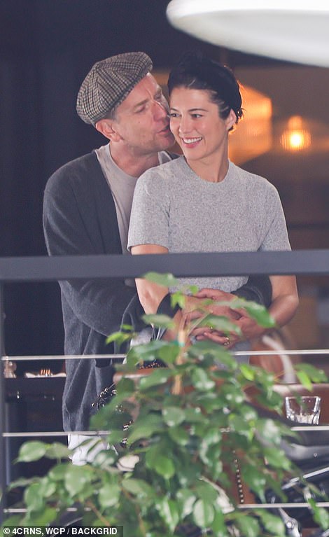 Ewan McGregor and Mary Elizabeth Winstead pack on the PDA in first outing after they tied the knot