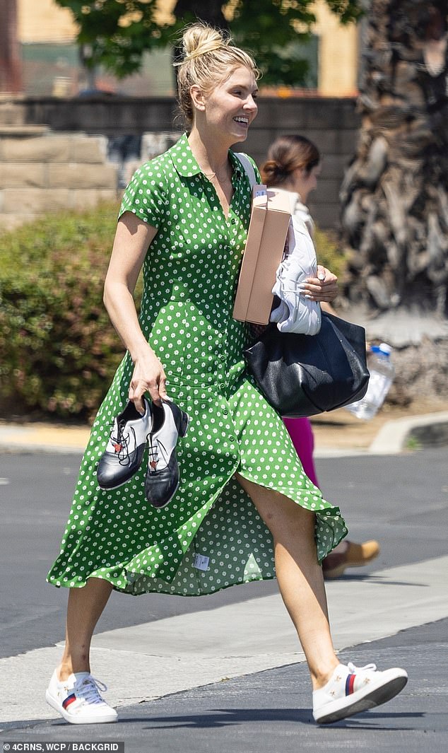 Amanda Kloots is springtime chic in bright green dress while making her way to tap dance class in LA